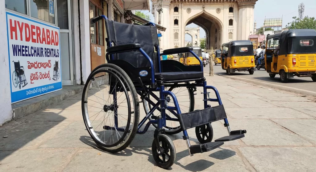 Wheelchair for rent in Hyderabad near Charminar – outdoor photo with rental signage